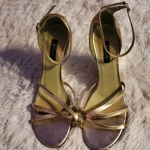 N.Y.L.A gold wedge sandal 4" heel, size 10
